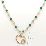 Silver necklace with green malachite beads and heart pendant