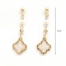   Gold-plated silver drop earrings with dangling mother-of-pearl four-leaf clovers