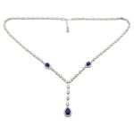 Silver necklace with blue stones and dark blue drop