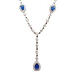 Silver necklace with blue stones and dark blue drop