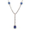 Silver necklace with blue stones and dark blue drop