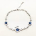 Blue stone silver bracelet with dark blue drop