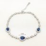 Blue stone silver bracelet with dark blue drop