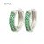 Small silver hoop earrings with green stones