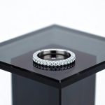 Silver Infinity ring with many stones