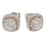 Silver stud earrings with sparkling stones