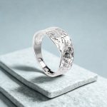 Silver hammered-style ring