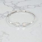 Silver open bangle with mother-of-pearl heart