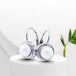 Silver pearl earrings with latch-back closure