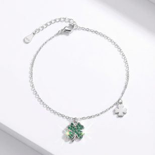 Silver bracelet with green stone clover charm