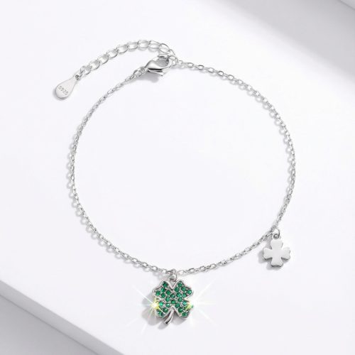 Silver bracelet with green stone clover charm