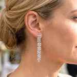 Silver drop / dangle earrings with leaf pattern