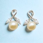 Freshwater pearl silver earrings with zirconia leaves