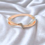 Thin rose gold ring with zirconia stones