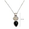 Silver necklace with black and white onyx stones