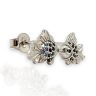Silver fish earrings with blue stones