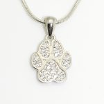 Silver paw pendant with zirconia stones