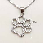 Silver pendant with sparkling paw print