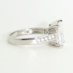 Silver engagement ring with square zirconia stone