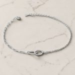 Asymmetrical thin silver bracelet