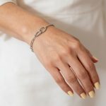 Asymmetrical thin silver bracelet