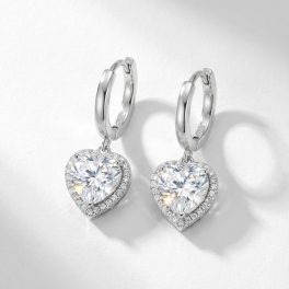 Silver hoop earrings with sparkling zirconia hearts
