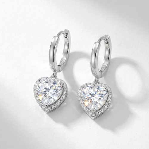 Silver hoop earrings with sparkling zirconia hearts
