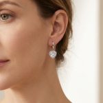 Silver hoop earrings with sparkling zirconia hearts