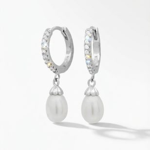 Silver hoop earrings with elegant pearl pendants