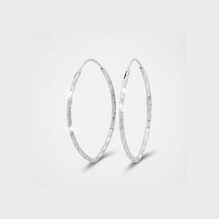 Oval engraved silver hoop earrings