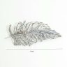 Windblown feather antique silver brooch
