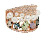 Silver cocktail ring in rose gold color with white pearls and colored stones 