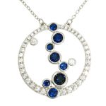 Silver circle necklace with sapphire blue stones