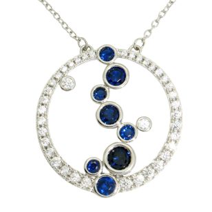 Silver circle necklace with sapphire blue stones