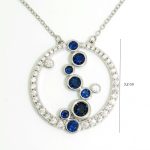 Silver circle necklace with sapphire blue stones