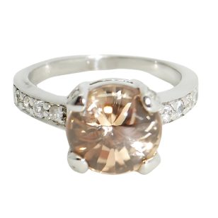 Silver ring with peach-colored stone