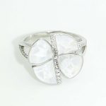 Silver ring with mother-of-pearl flower