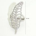 Silver ring with leaf pattern and zirconia stones