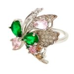 Silver butterfly cocktail ring with green stone