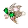 Silver butterfly cocktail ring with green stone