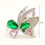 Silver butterfly cocktail ring with green stone