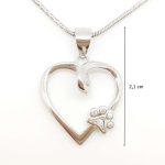 Silver heart pendant with animal motif