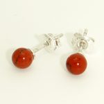Silver earrings with coral red spheres