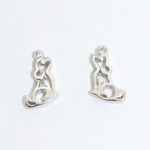 Playful dog pendant and earrings silver jewelry set
