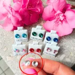 Hypoallergenic silicone earrings with white zirconia stone