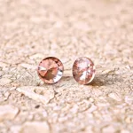 Hypoallergenic silicone earrings with pink  zirconia stone