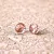 Hypoallergenic silicone earrings with pink  zirconia stone