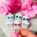 Hypoallergenic silicone earrings with pink  zirconia stone