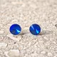 Hypoallergenic silicone earrings with dark blue zirconia stone