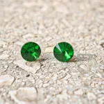 Hypoallergenic silicone earrings with green zirconia stone